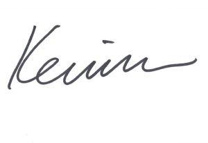 Kevin's signature in bold, black cursive on a white background.