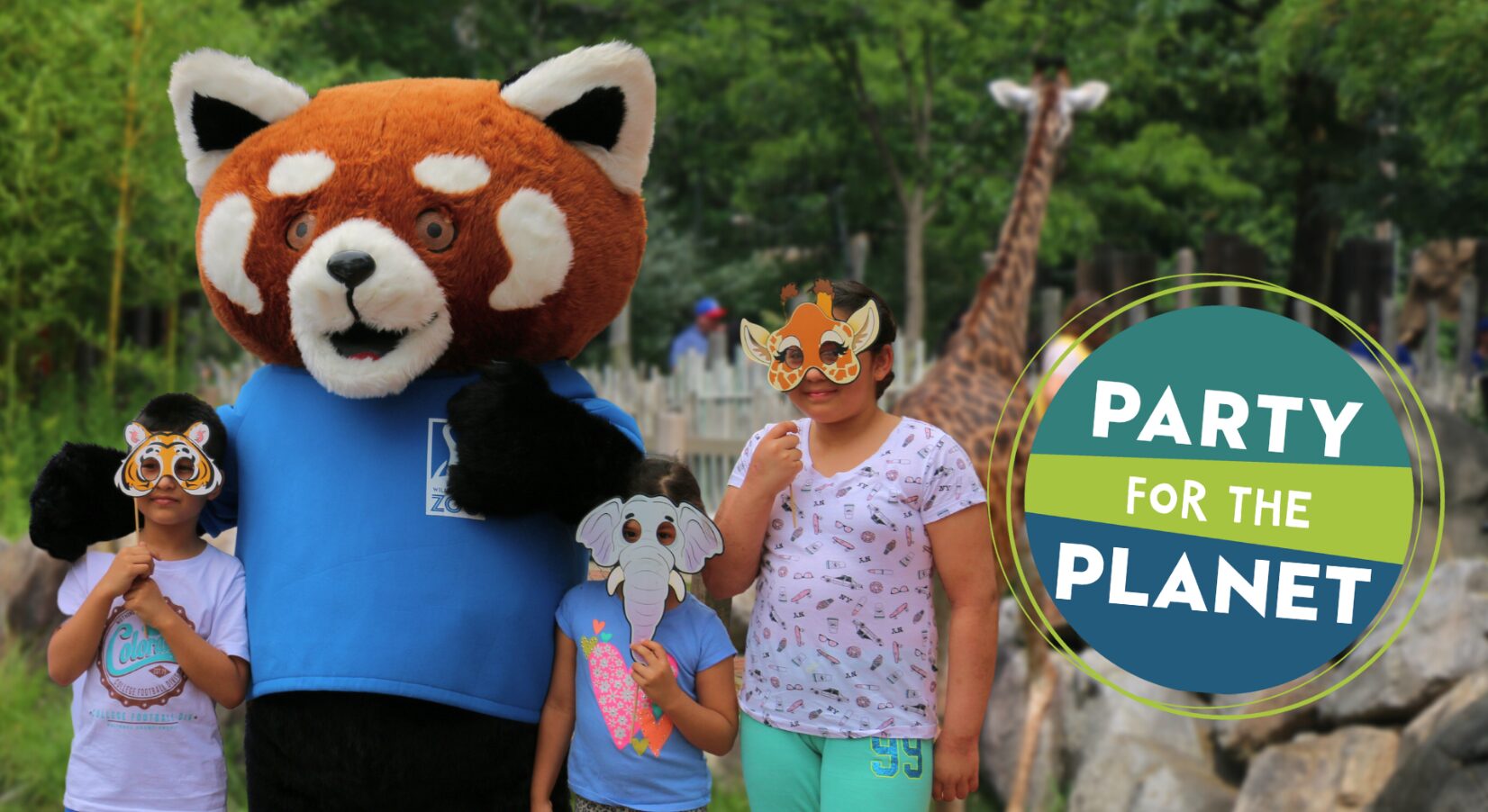 A red panda mascot with three children wearing animal masks at a zoo. A giraffe is in the background. Text: "Party for the Planet."